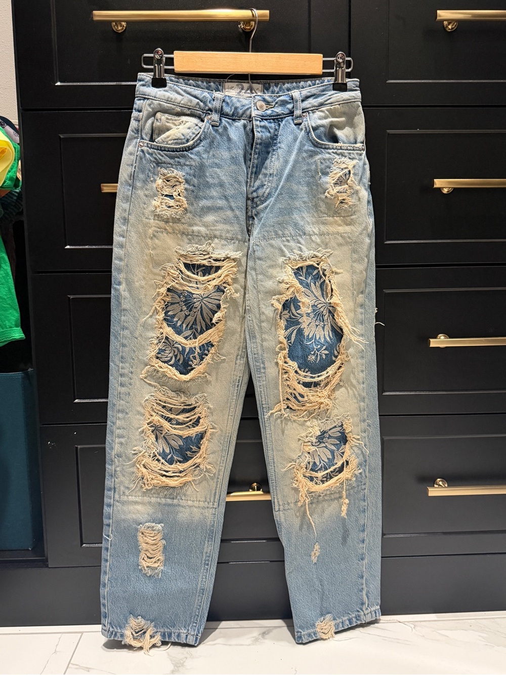 We The Free Light Blue Distressed Boyfriend Jeans with Floral Underlay